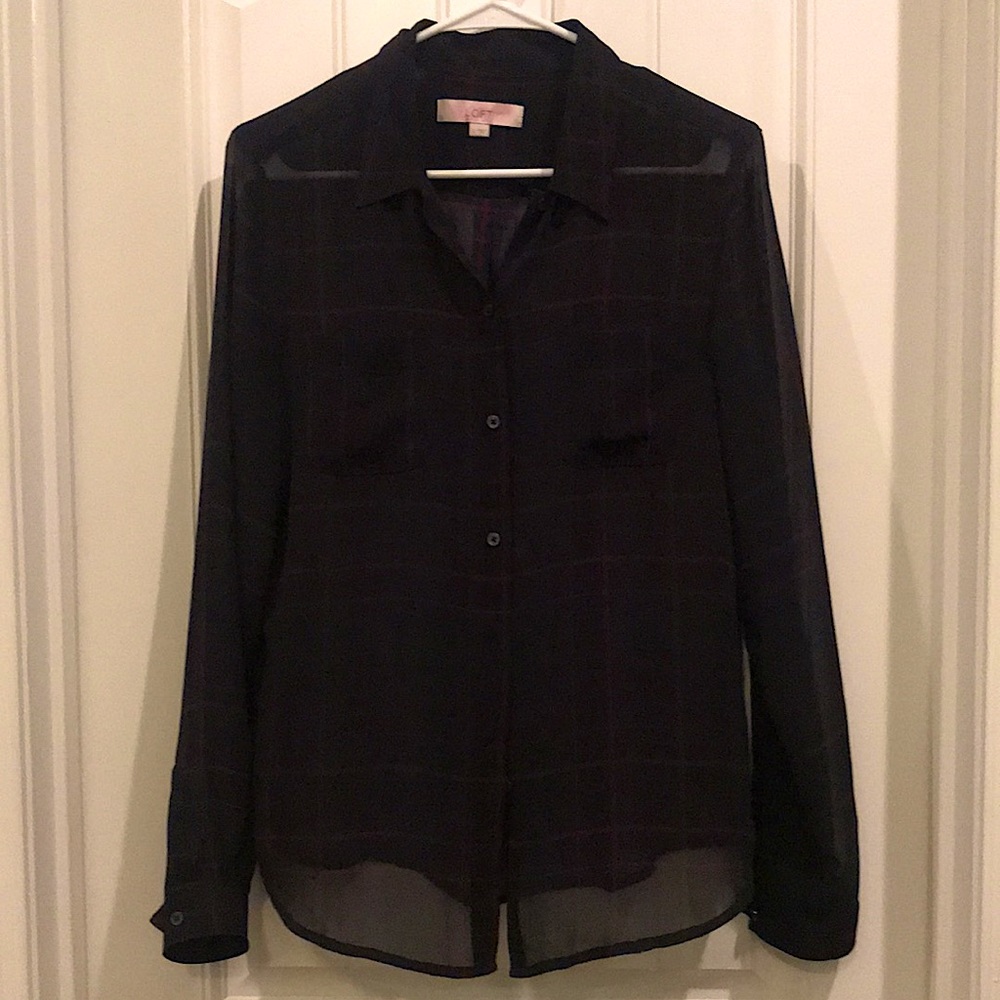 Sheer plaid button up shirt.
